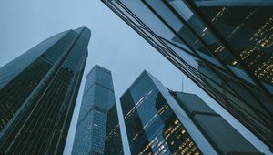 Preview wallpaper skyscrapers, buildings, bottom view, evening