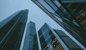 Preview wallpaper skyscrapers, buildings, bottom view, evening