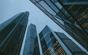 Preview wallpaper skyscrapers, buildings, bottom view, evening