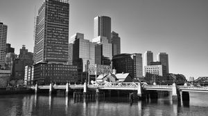 Preview wallpaper skyscrapers, buildings, bridge, river, city, black and white