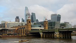 Preview wallpaper skyscrapers, buildings, bridge, river, boat, city