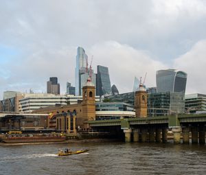 Preview wallpaper skyscrapers, buildings, bridge, river, boat, city