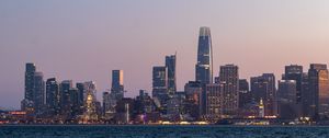 Preview wallpaper skyscrapers, buildings, city, dusk, sea