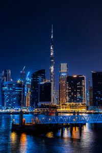 Preview wallpaper skyscrapers, buildings, city, night, architecture, backlight, dark