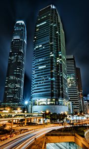 Preview wallpaper skyscrapers, buildings, city, night, lights, long exposure