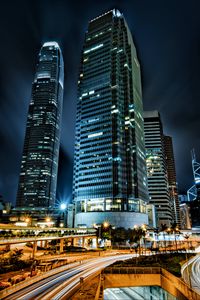 Preview wallpaper skyscrapers, buildings, city, night, lights, long exposure