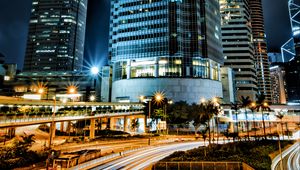 Preview wallpaper skyscrapers, buildings, city, night, lights, long exposure