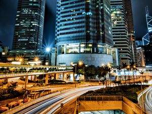 Preview wallpaper skyscrapers, buildings, city, night, lights, long exposure