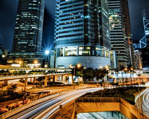 Preview wallpaper skyscrapers, buildings, city, night, lights, long exposure