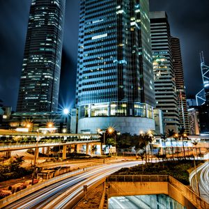 Preview wallpaper skyscrapers, buildings, city, night, lights, long exposure