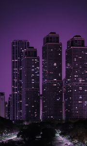 Preview wallpaper skyscrapers, buildings, city, night, dark, purple