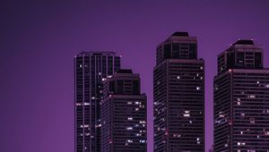 Preview wallpaper skyscrapers, buildings, city, night, dark, purple