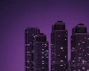 Preview wallpaper skyscrapers, buildings, city, night, dark, purple