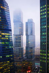 Preview wallpaper skyscrapers, buildings, city, fog, architecture, modern