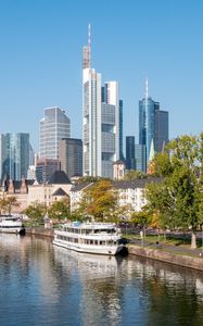 Preview wallpaper skyscrapers, buildings, city, river, ship