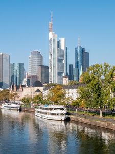 Preview wallpaper skyscrapers, buildings, city, river, ship