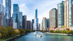 Preview wallpaper skyscrapers, buildings, city, river, boat