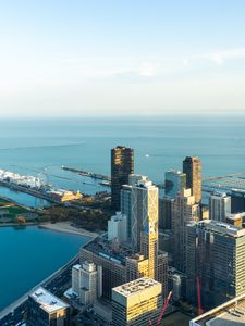 Preview wallpaper skyscrapers, buildings, city, pier, sea, aerial view