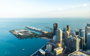 Preview wallpaper skyscrapers, buildings, city, pier, sea, aerial view