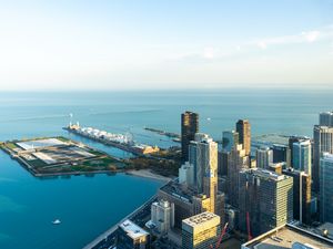 Preview wallpaper skyscrapers, buildings, city, pier, sea, aerial view