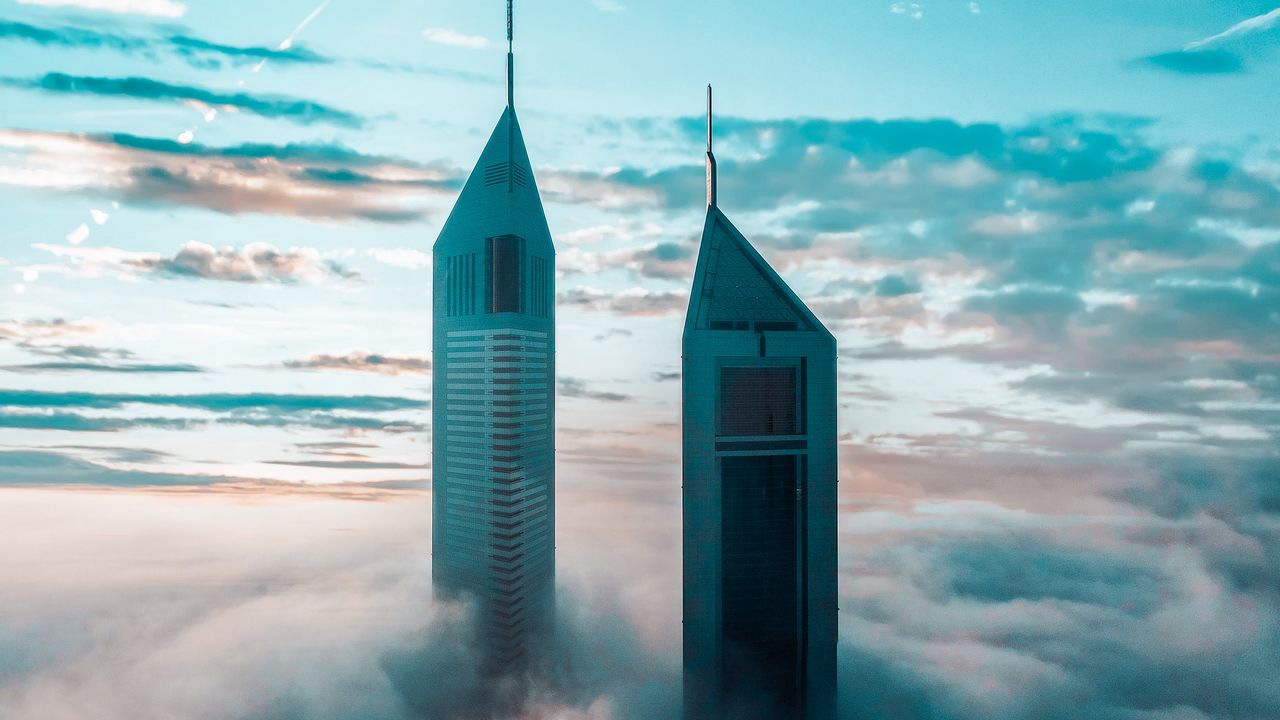 Wallpaper skyscrapers, buildings, clouds, sky