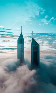 Preview wallpaper skyscrapers, buildings, clouds, sky