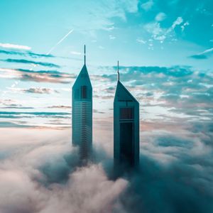 Preview wallpaper skyscrapers, buildings, clouds, sky