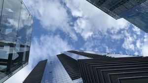 Preview wallpaper skyscrapers, buildings, clouds, bottom view, blue