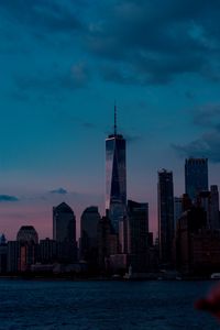 Preview wallpaper skyscrapers, buildings, coast, city, dusk, evening