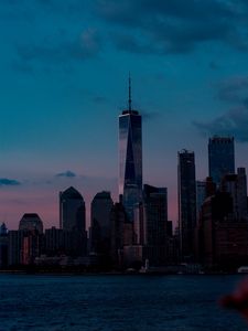 Preview wallpaper skyscrapers, buildings, coast, city, dusk, evening