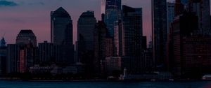 Preview wallpaper skyscrapers, buildings, coast, city, dusk, evening