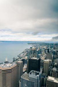 Preview wallpaper skyscrapers, buildings, coast, architecture, sea, city