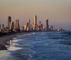 Preview wallpaper skyscrapers, buildings, coast, sea, beach, city