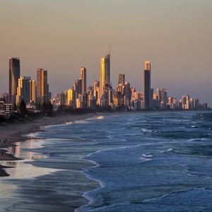 Preview wallpaper skyscrapers, buildings, coast, sea, beach, city