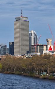 Preview wallpaper skyscrapers, buildings construction, trees, city