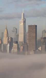 Preview wallpaper skyscrapers, buildings, fog, city