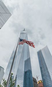 Preview wallpaper skyscrapers, buildings, glass, architecture, flag, usa