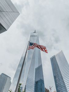 Preview wallpaper skyscrapers, buildings, glass, architecture, flag, usa