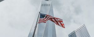 Preview wallpaper skyscrapers, buildings, glass, architecture, flag, usa