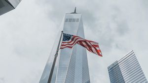 Preview wallpaper skyscrapers, buildings, glass, architecture, flag, usa