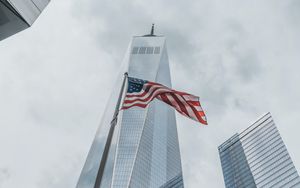 Preview wallpaper skyscrapers, buildings, glass, architecture, flag, usa