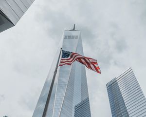 Preview wallpaper skyscrapers, buildings, glass, architecture, flag, usa