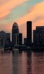 Preview wallpaper skyscrapers, buildings, lights, river, twilight, city