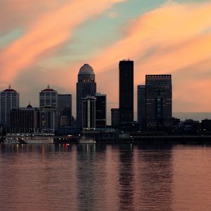 Preview wallpaper skyscrapers, buildings, lights, river, twilight, city