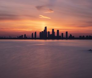 Preview wallpaper skyscrapers, buildings, silhouettes, city, sea