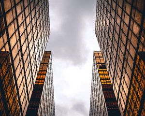 Preview wallpaper skyscrapers, buildings, sky, clouds, facade