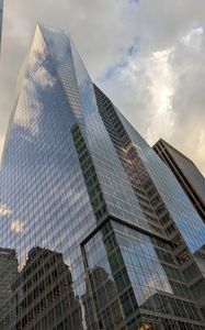 Preview wallpaper skyscrapers, buildings, sky, clouds, glass, reflection