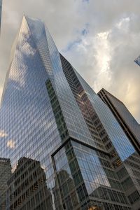 Preview wallpaper skyscrapers, buildings, sky, clouds, glass, reflection