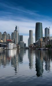 Preview wallpaper skyscrapers, buildings, water, reflection, city