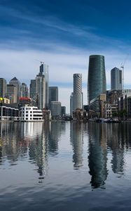 Preview wallpaper skyscrapers, buildings, water, reflection, city